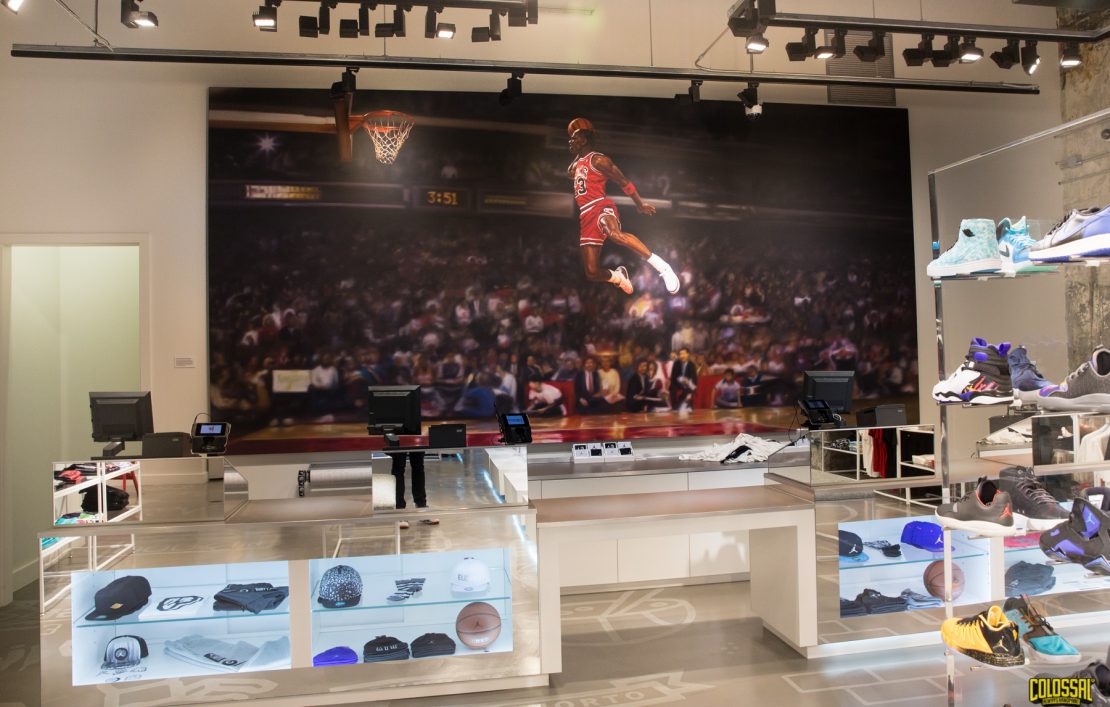 Nike store mural hand-painted by Colossal Media.