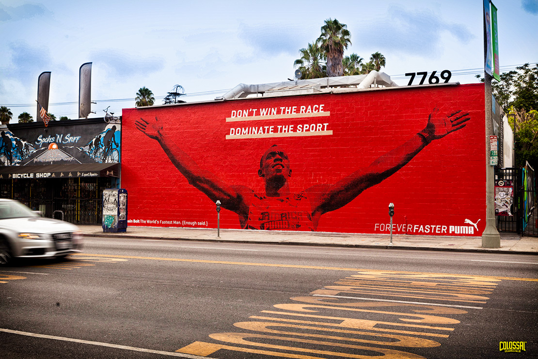 Out of home advertising mural hand painted by Colossal Media in Los Angeles