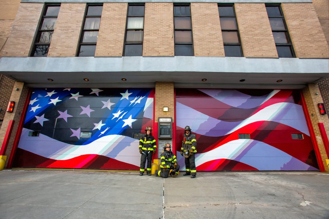 Greenpoint firefighters pose with Colossal Media's mural