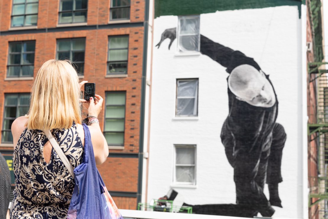 Pedestrians snap photos of First Republic Banks art mural on The High Line.