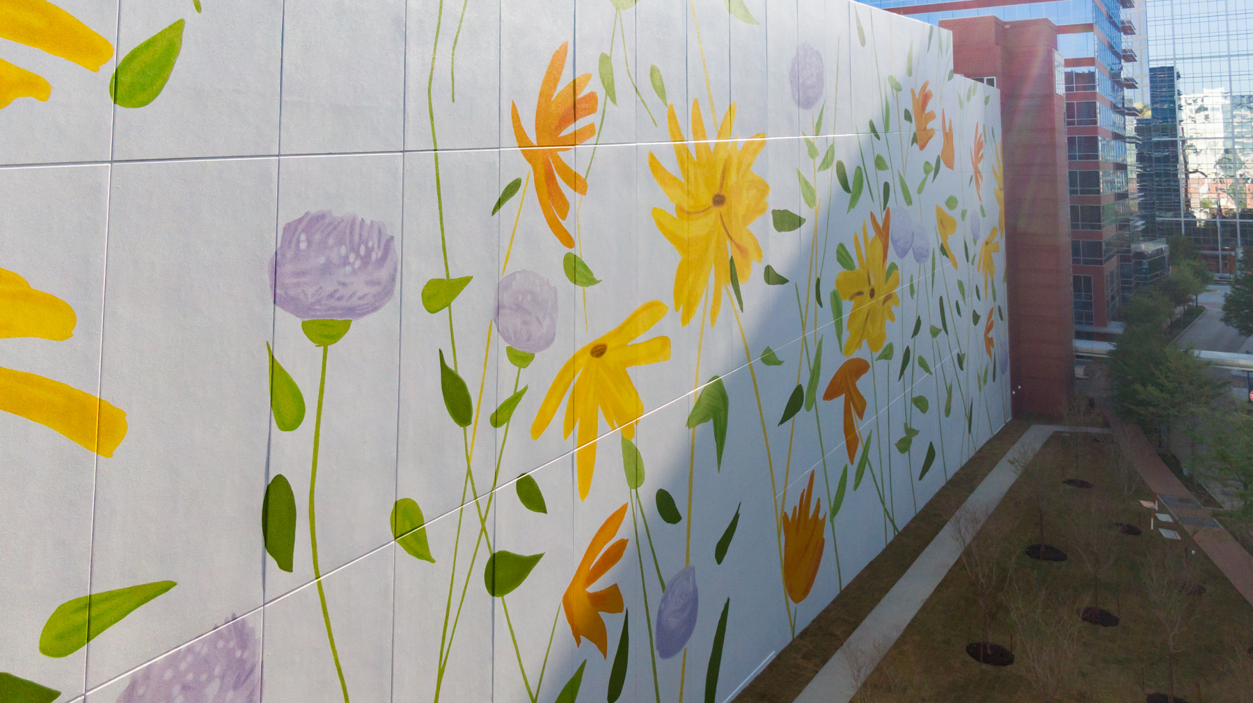 Colossal Media hand-painted floral mural for the Woodlands in Texas with art by Alex Katz.